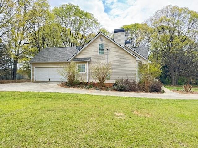 25 Browning Shoals Road Social Circle, GA 30025 - Photo 3 of 47 a view of a house with backyard and garden