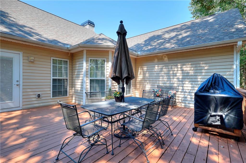 25 Browning Shoals Road Social Circle, GA 30025 - Photo 36 of 47 a front view of a house with patio table and chairs