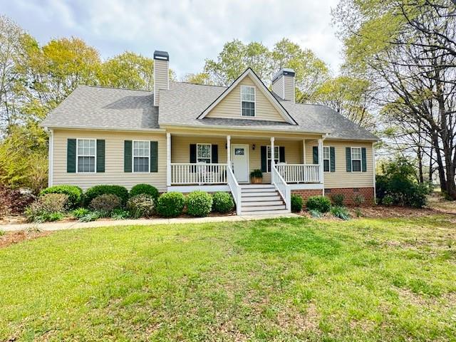25 Browning Shoals Road Social Circle, GA 30025 - Photo 44 of 47 a front view of a house with a yard
