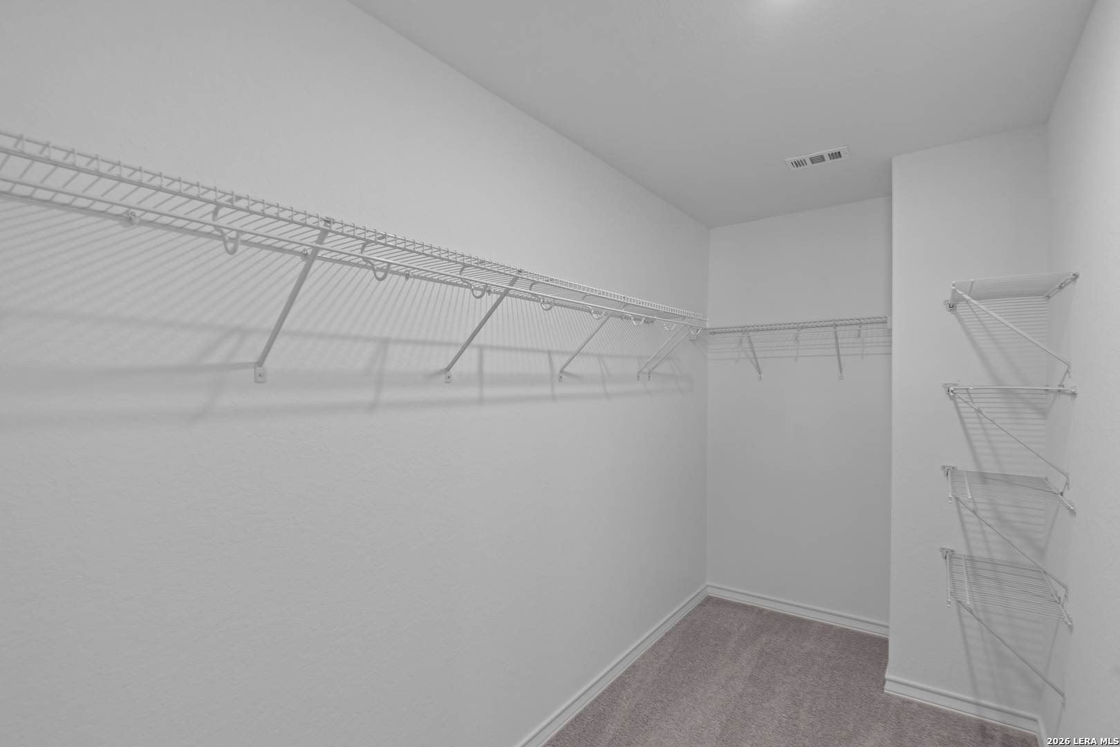 4061 Bermuda Lane Seguin, TX 78155 - Photo 17 of 25 a view of a room with racks on the wall
