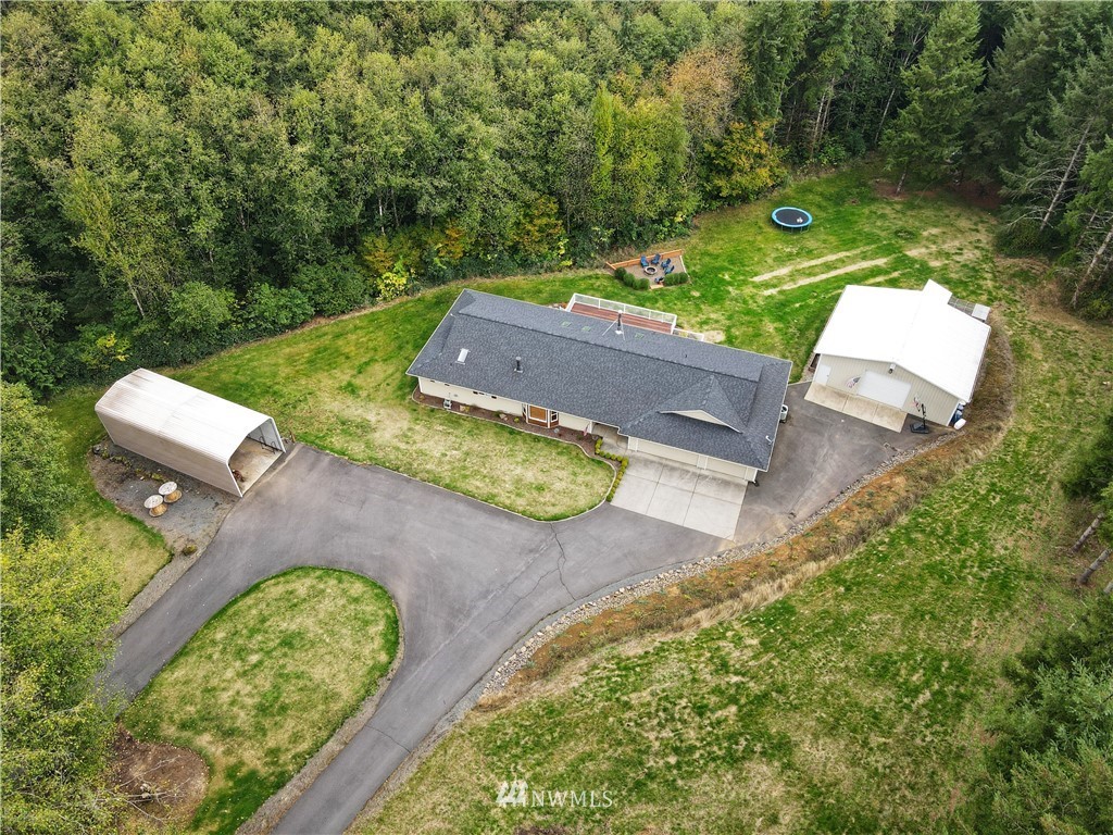 317 Grasseth Poston Road Longview, WA 98632 - Photo 2 of 36 an aerial view of a house with a yard