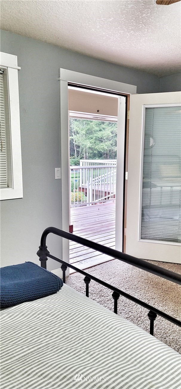 317 Grasseth Poston Road Longview, WA 98632 - Photo 20 of 36 a bedroom with a bed and a window