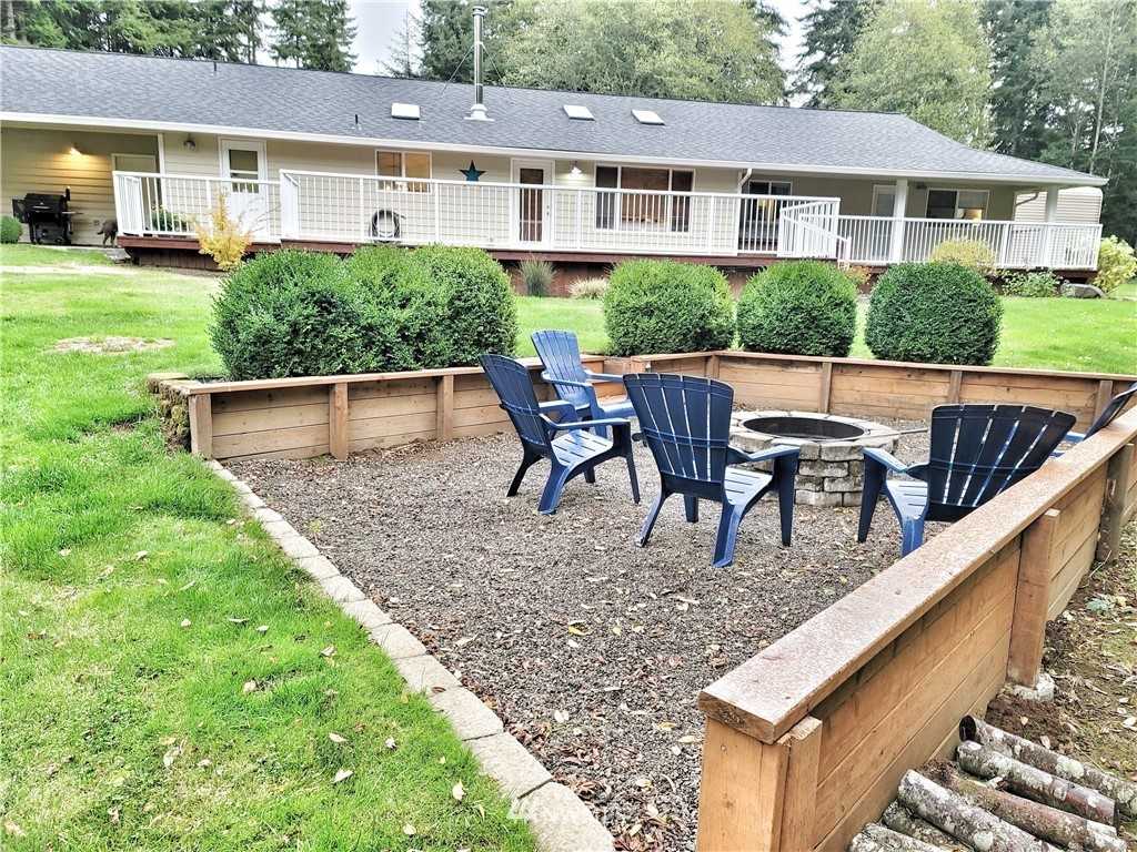 317 Grasseth Poston Road Longview, WA 98632 - Photo 28 of 36 a view of house with a yard