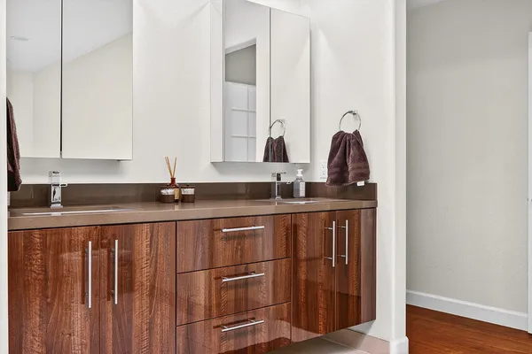 a kitchen with stainless steel appliances granite countertop a sink and a granite counter tops