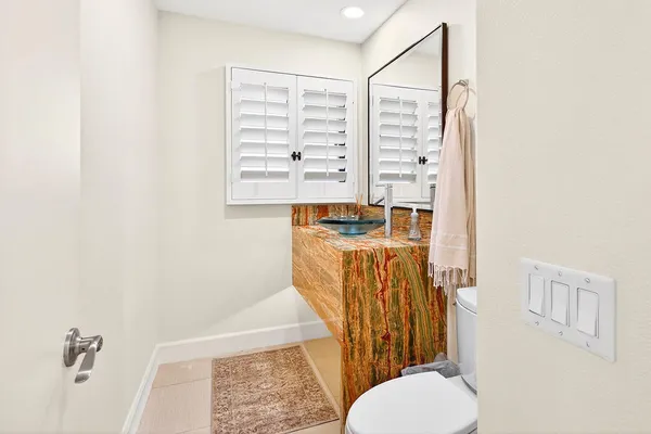 a kitchen with stainless steel appliances a refrigerator and a sink