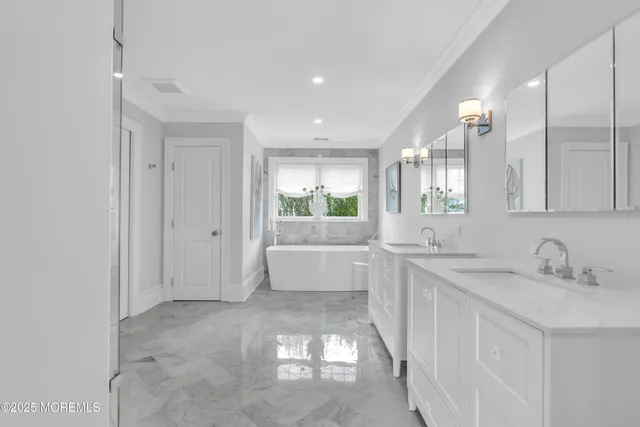 a bathroom with a shower and a sink