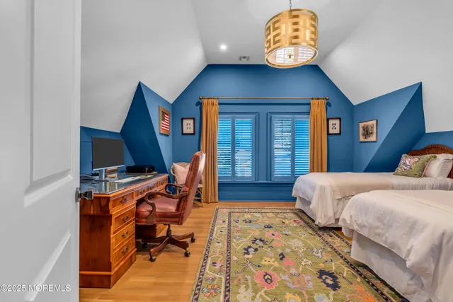 a bedroom with bed and a window