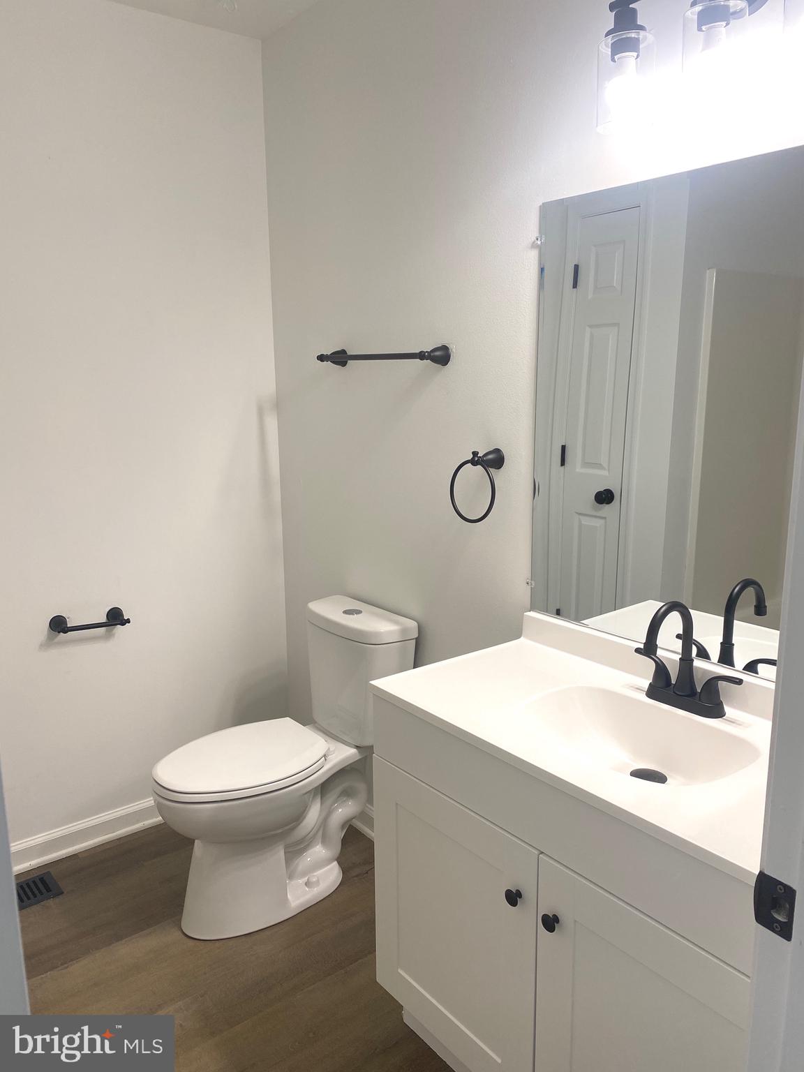 172 Jack Rabbit Lane Ranson, WV 25438 - Photo 20 of 34 a bathroom with a sink toilet and vanity