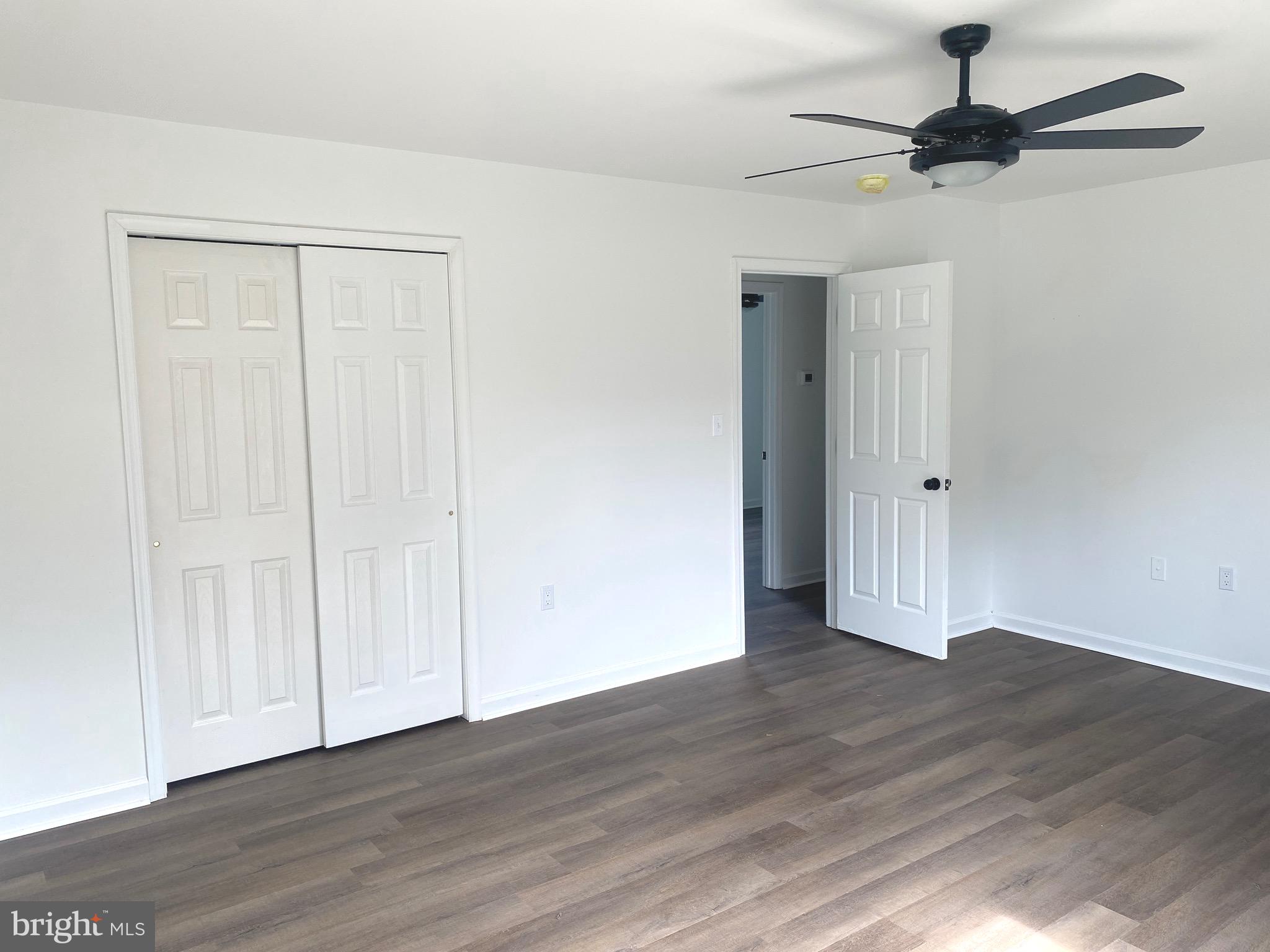 172 Jack Rabbit Lane Ranson, WV 25438 - Photo 22 of 34 a view of an empty room with wooden floor