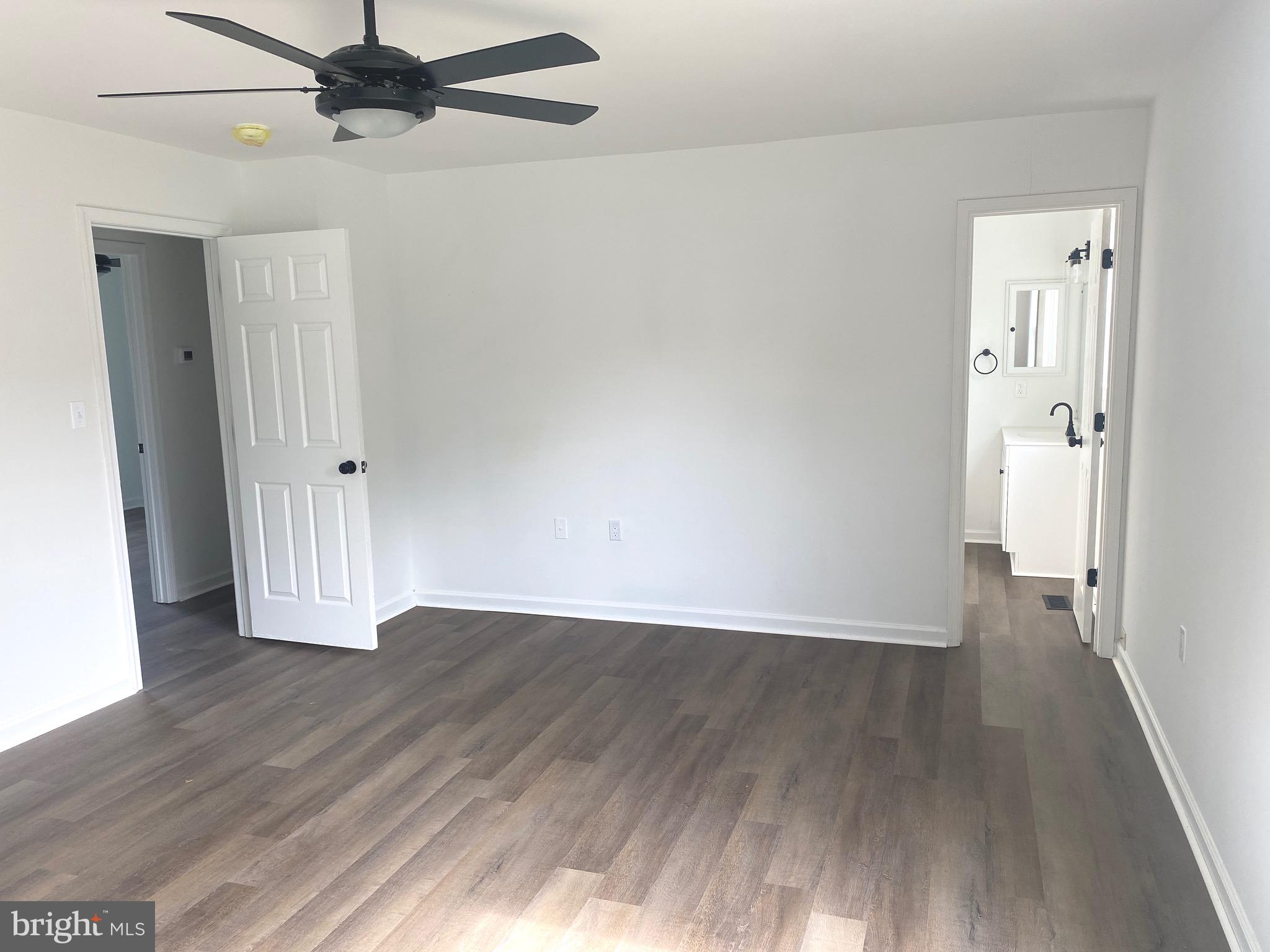 172 Jack Rabbit Lane Ranson, WV 25438 - Photo 23 of 34 wooden floor in an empty room with a window