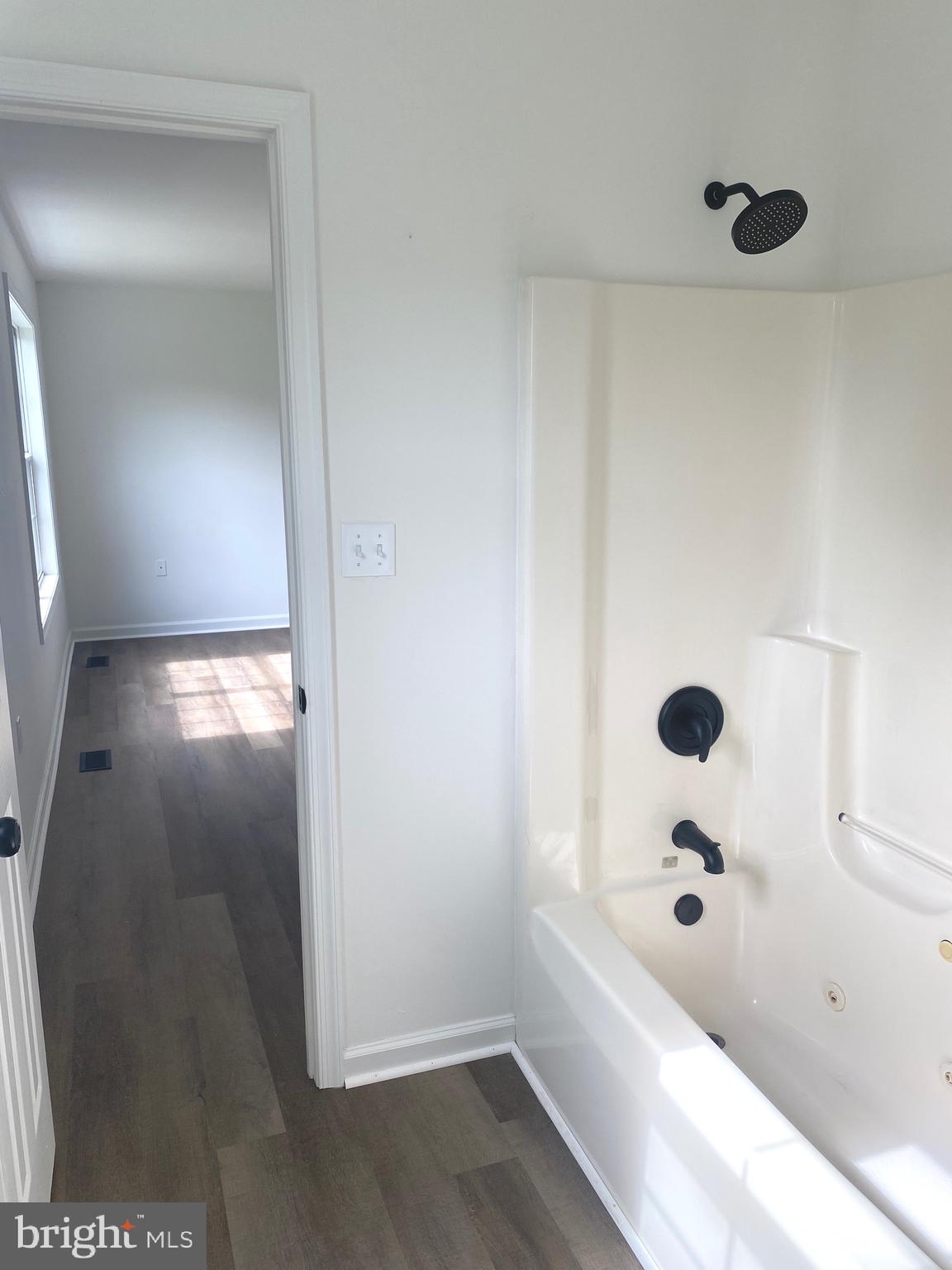 172 Jack Rabbit Lane Ranson, WV 25438 - Photo 25 of 34 a bathroom with a tub