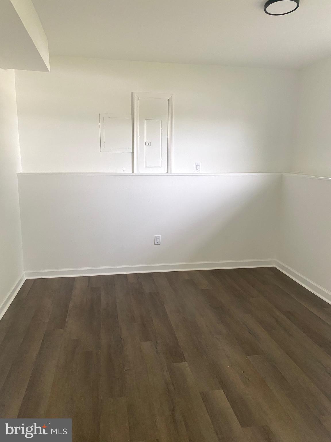 172 Jack Rabbit Lane Ranson, WV 25438 - Photo 30 of 34 an empty room with wooden floor and windows