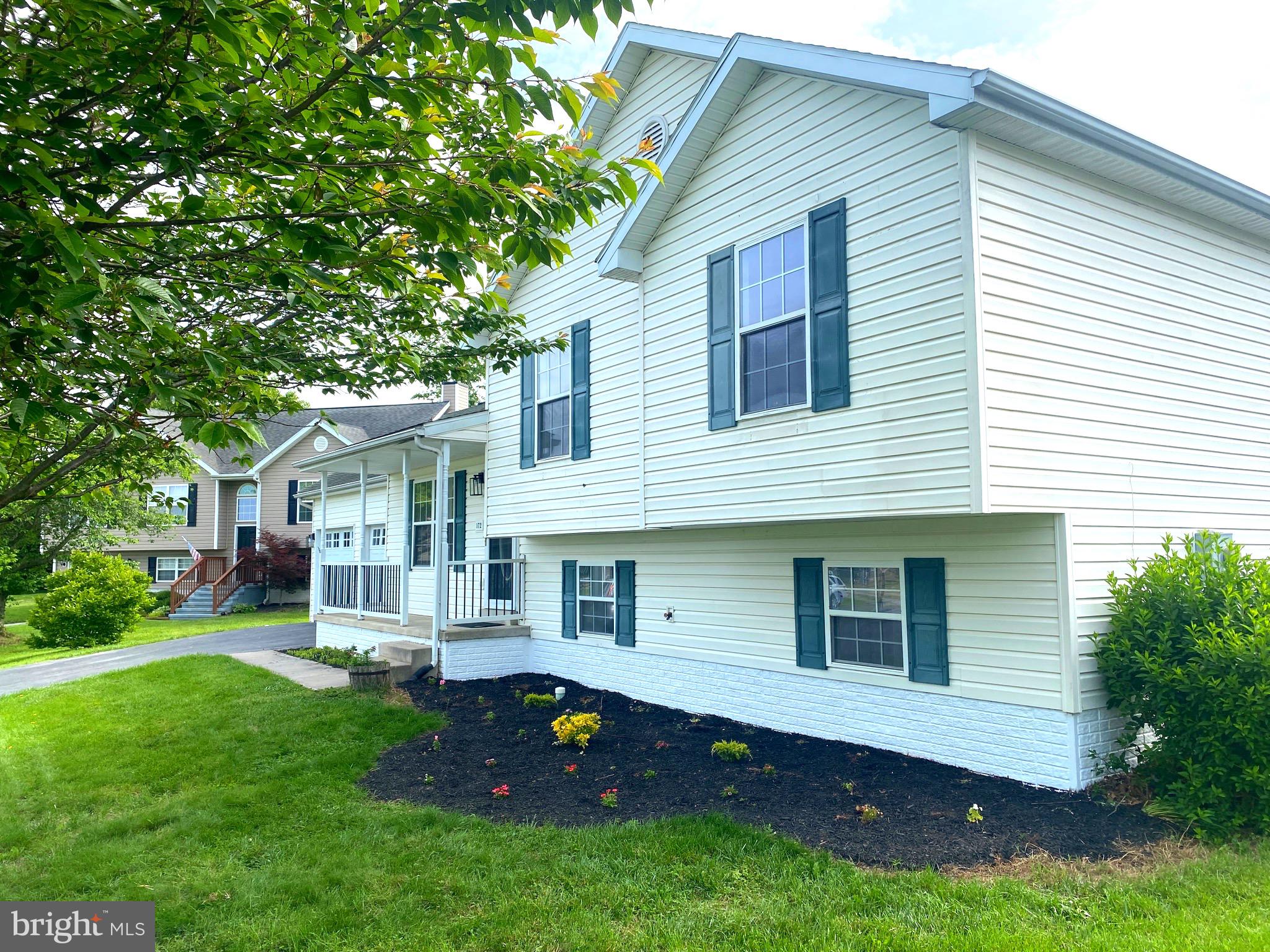 172 Jack Rabbit Lane Ranson, WV 25438 - Photo 3 of 34 front view of a house with a yard