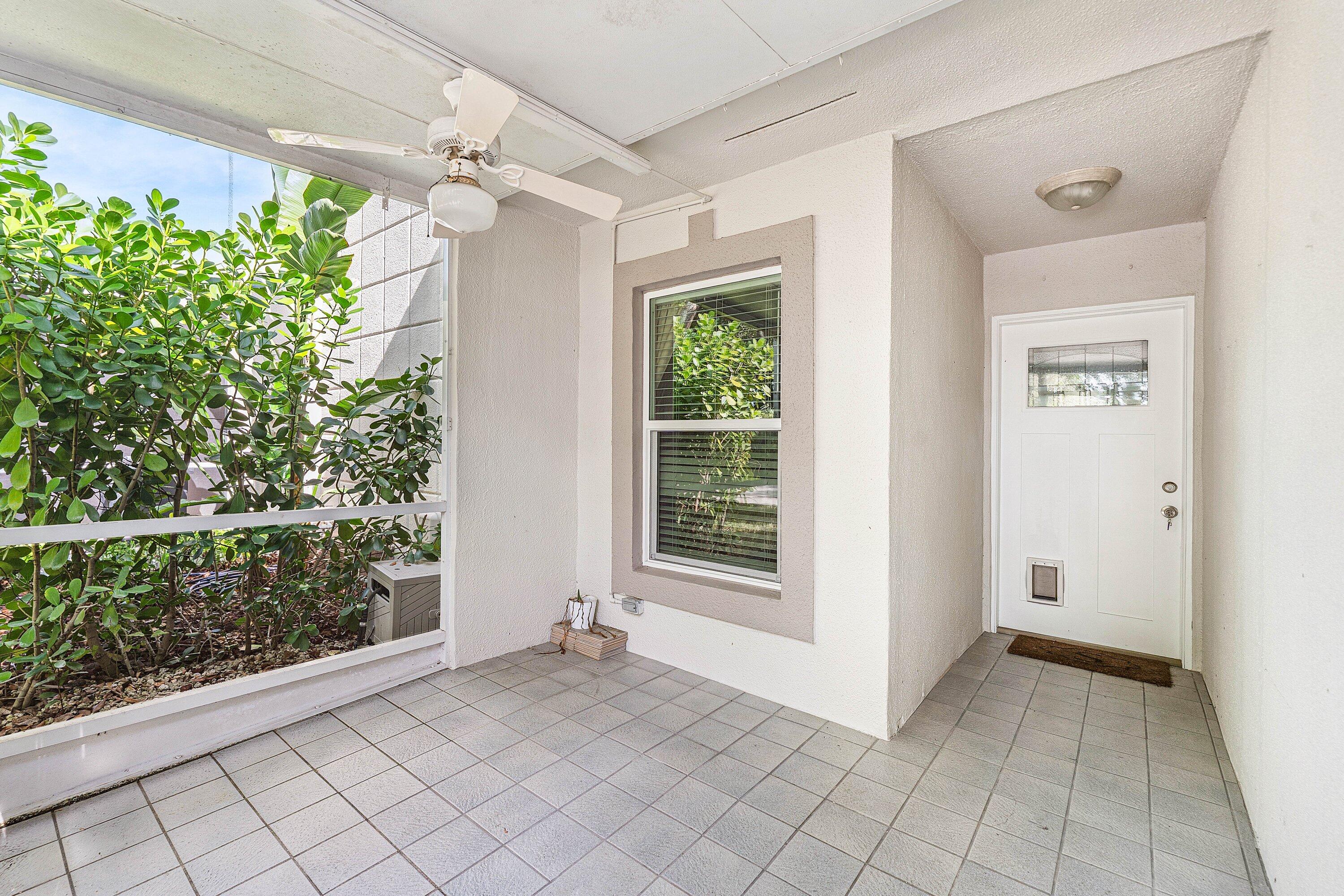 18900 Stewart Circle, Unit 2 Boca Raton, FL 33496 - Photo 27 of 34 Front Screened Patio