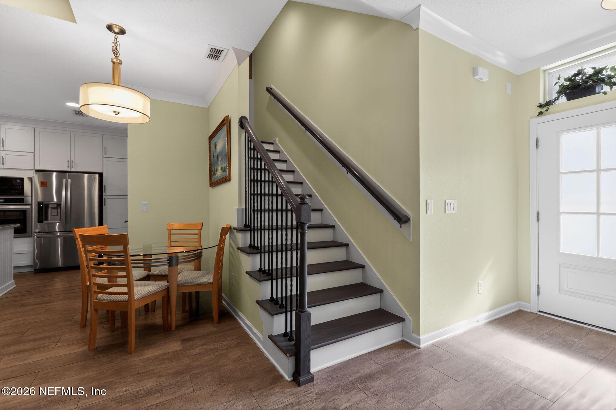 96017 Breezeway Court Yulee, FL 32097 - Photo 5 of 30 a view of livingroom with furniture and staircase