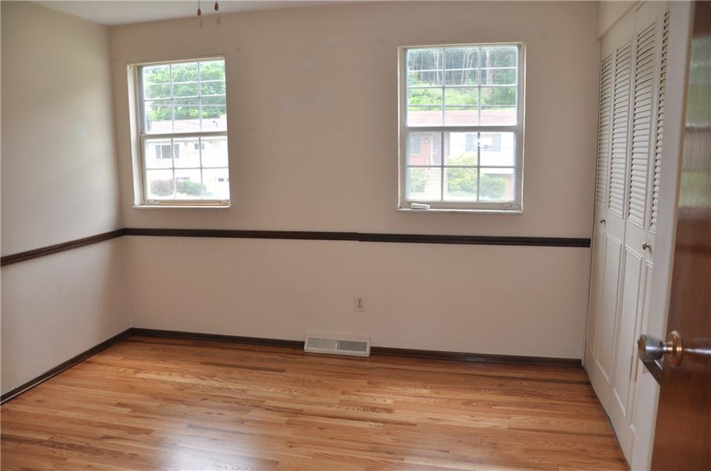 120 Rangley Drive Pittsburgh, PA 15209 - Photo 11 of 18 Bedroom with refinished hardwood floors and plenty of closet space and light! Measures 11' x 11'