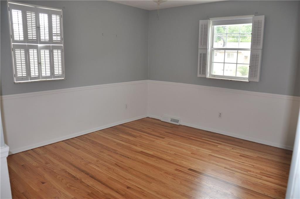 120 Rangley Drive Pittsburgh, PA 15209 - Photo 12 of 18 Third bedroom with refinished hardwood floors, measures 14' x 11'.