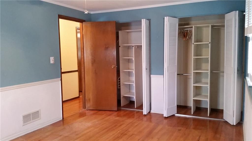 120 Rangley Drive Pittsburgh, PA 15209 - Photo 9 of 18 Master bedroom with built in closet shelving. Measures 16' x 11'