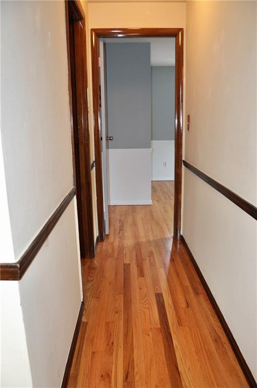 120 Rangley Drive Pittsburgh, PA 15209 - Photo 10 of 18 Hallway with refinished hardwood floors.