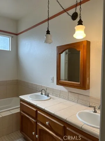 a bathroom with a bathtub and a toilet