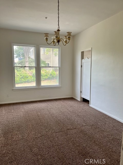431 Chestnut Avenue Redlands, CA 92373 - Photo 4 of 23 a view of an empty room with a window