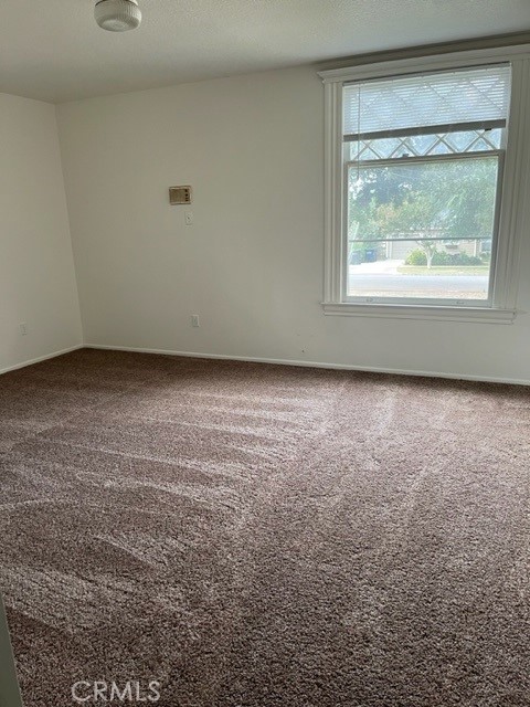431 Chestnut Avenue Redlands, CA 92373 - Photo 8 of 23 a view of an empty room with a window