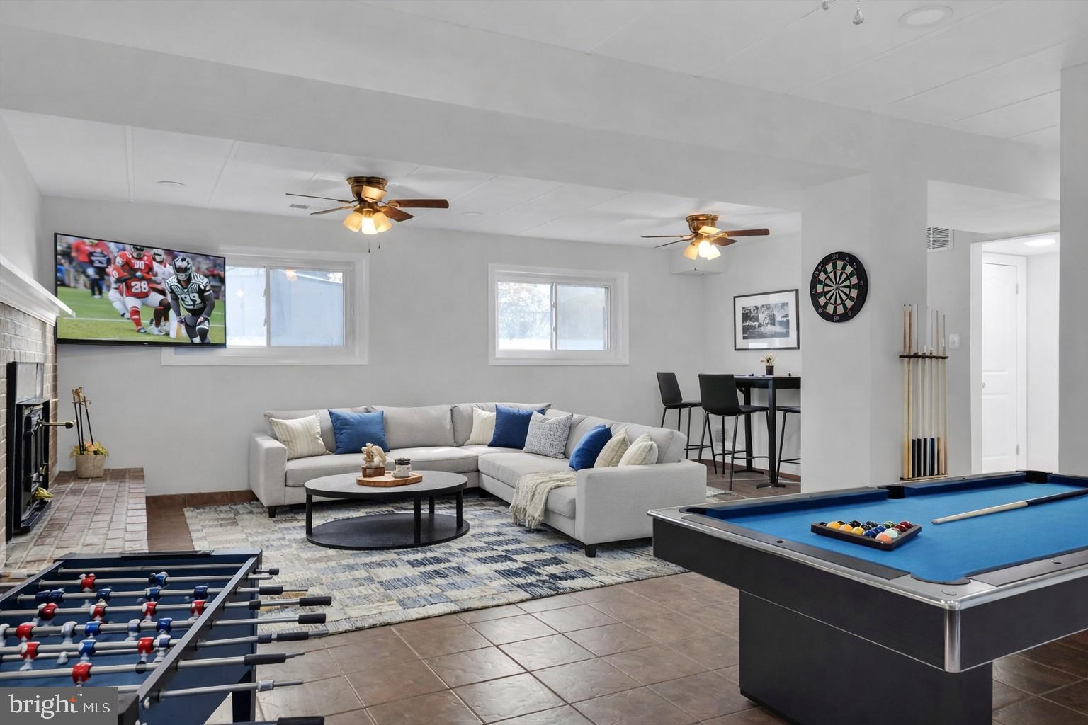 4224 Kinmount Road Lanham, MD 20706 - Photo 28 of 45 a living room with furniture and a table