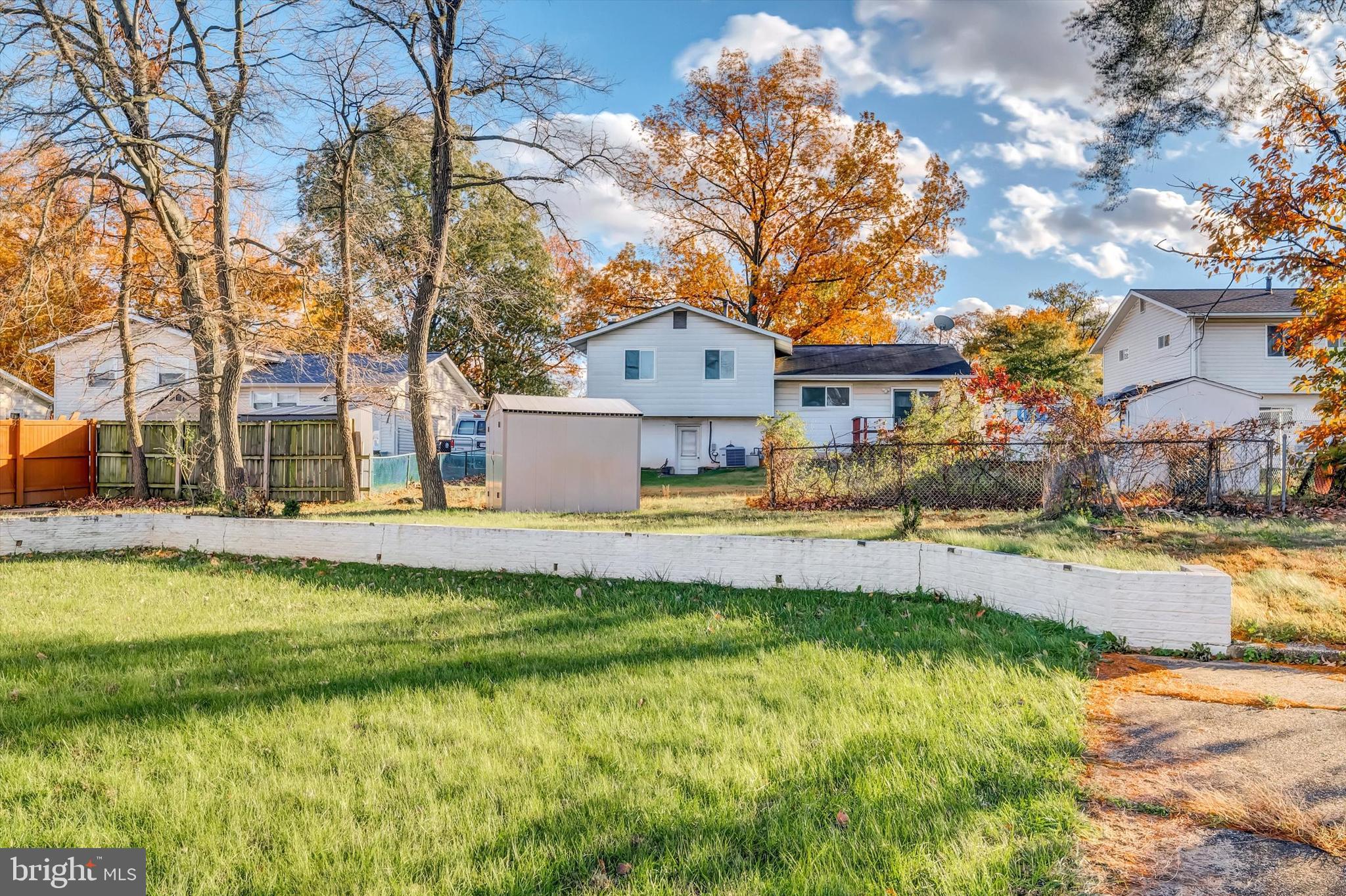 4224 Kinmount Road Lanham, MD 20706 - Photo 43 of 45 a front view of a house with swimming pool and a yard