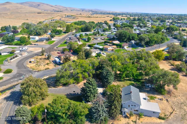 an aerial view of a city with lots of residential buildings