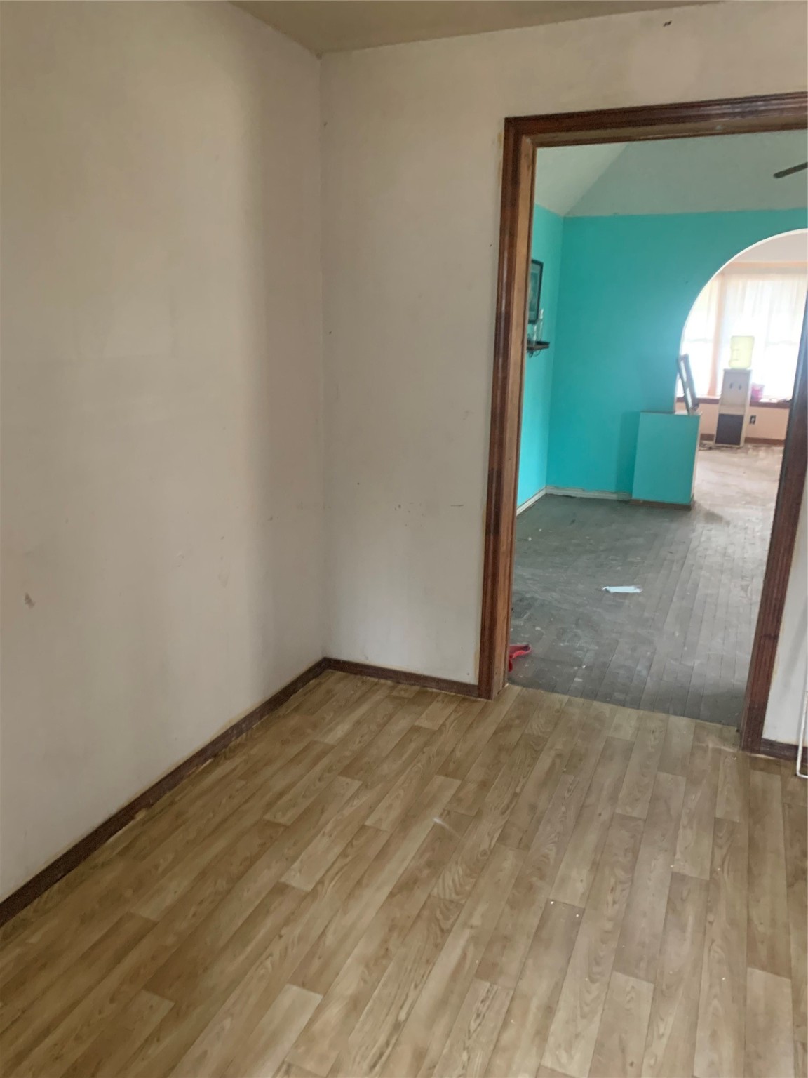5001 Sherman Street Houston, TX 77011 - Photo 14 of 23 a view of a livingroom with wooden floor and a potted plant