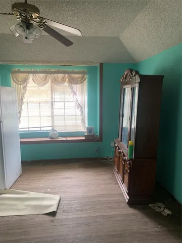 a view of a room that has a window