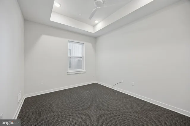 an empty room with a bathroom