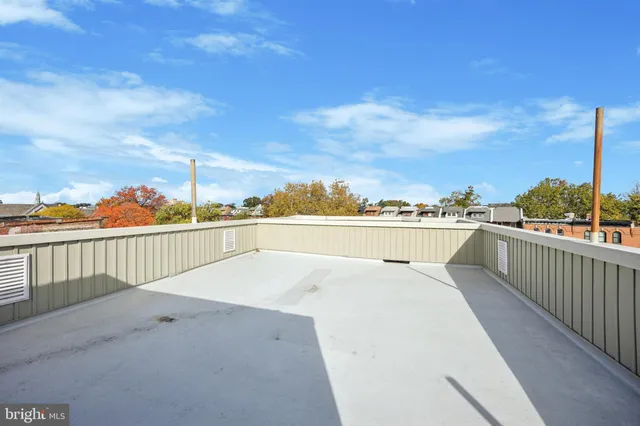 a view of a terrace with furniture