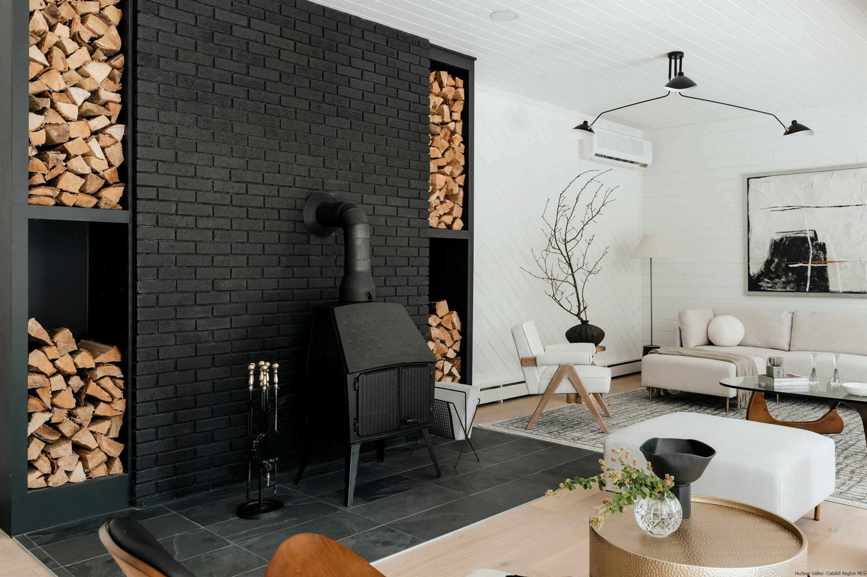 187 Bloom Road Barryville, NY 12719 - Photo 12 of 35 a living room with furniture and a rug