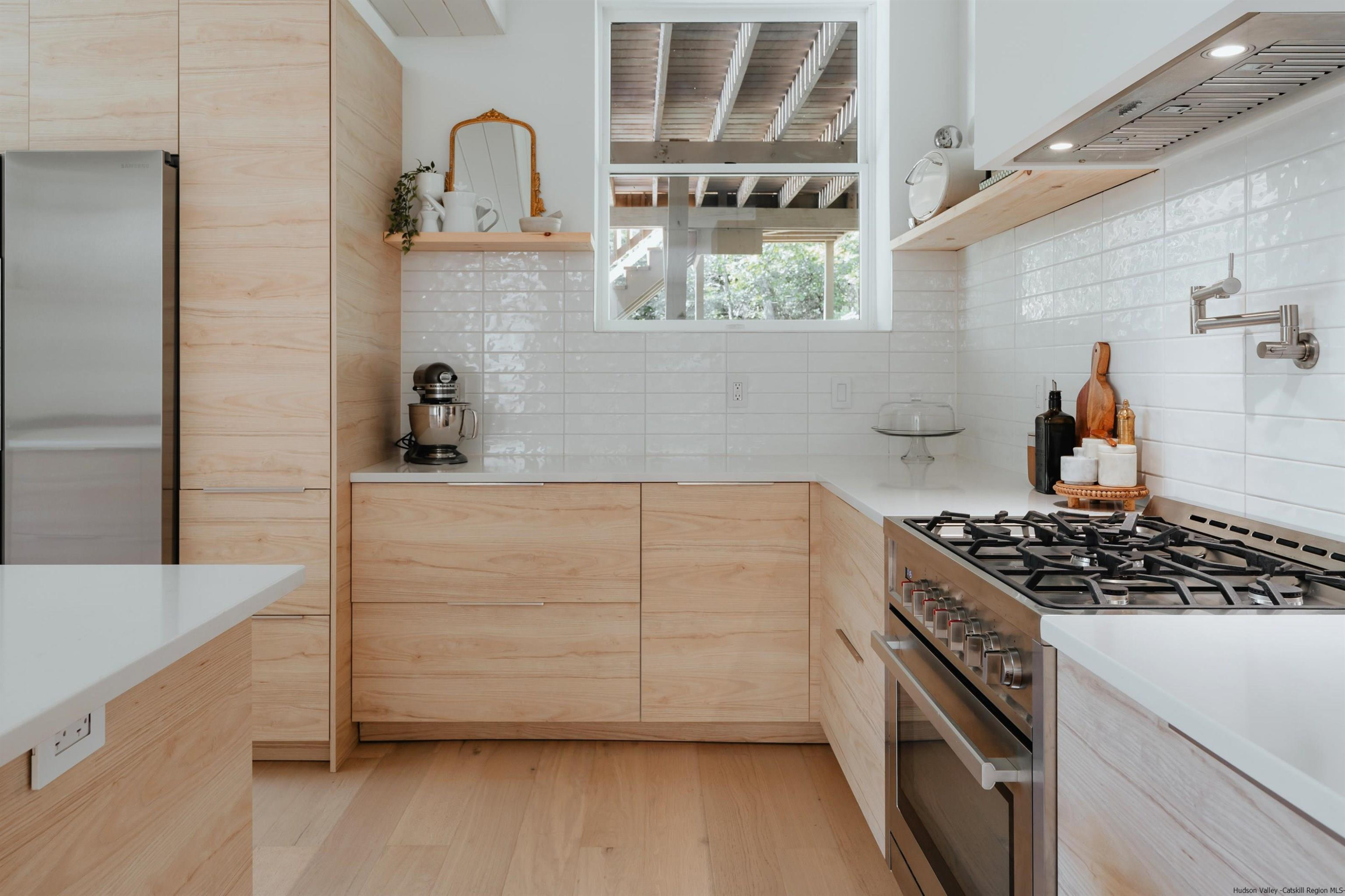 187 Bloom Road Barryville, NY 12719 - Photo 14 of 35 a kitchen with cabinets and stove