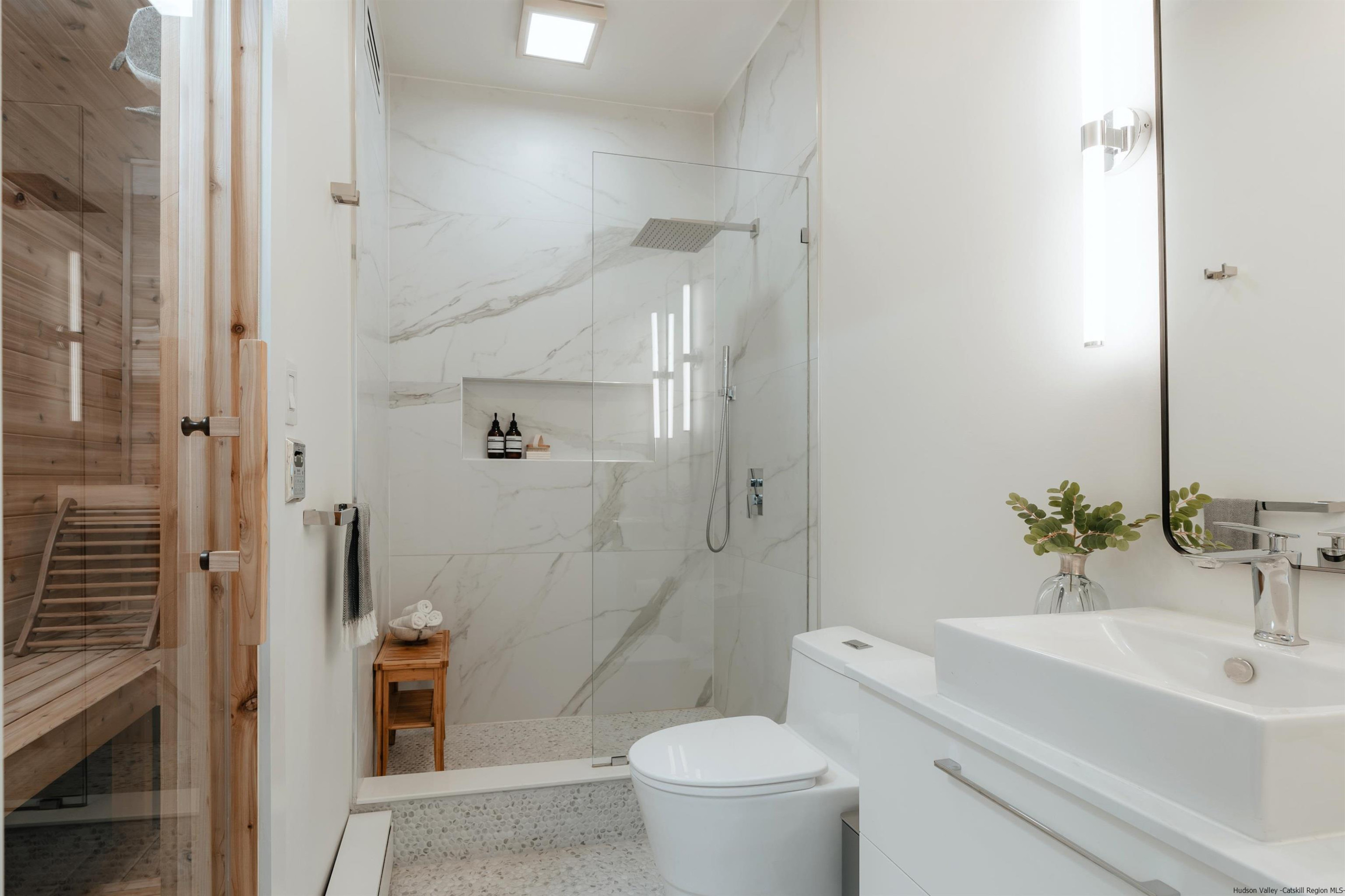 187 Bloom Road Barryville, NY 12719 - Photo 17 of 35 a bathroom with a sink toilet and shower