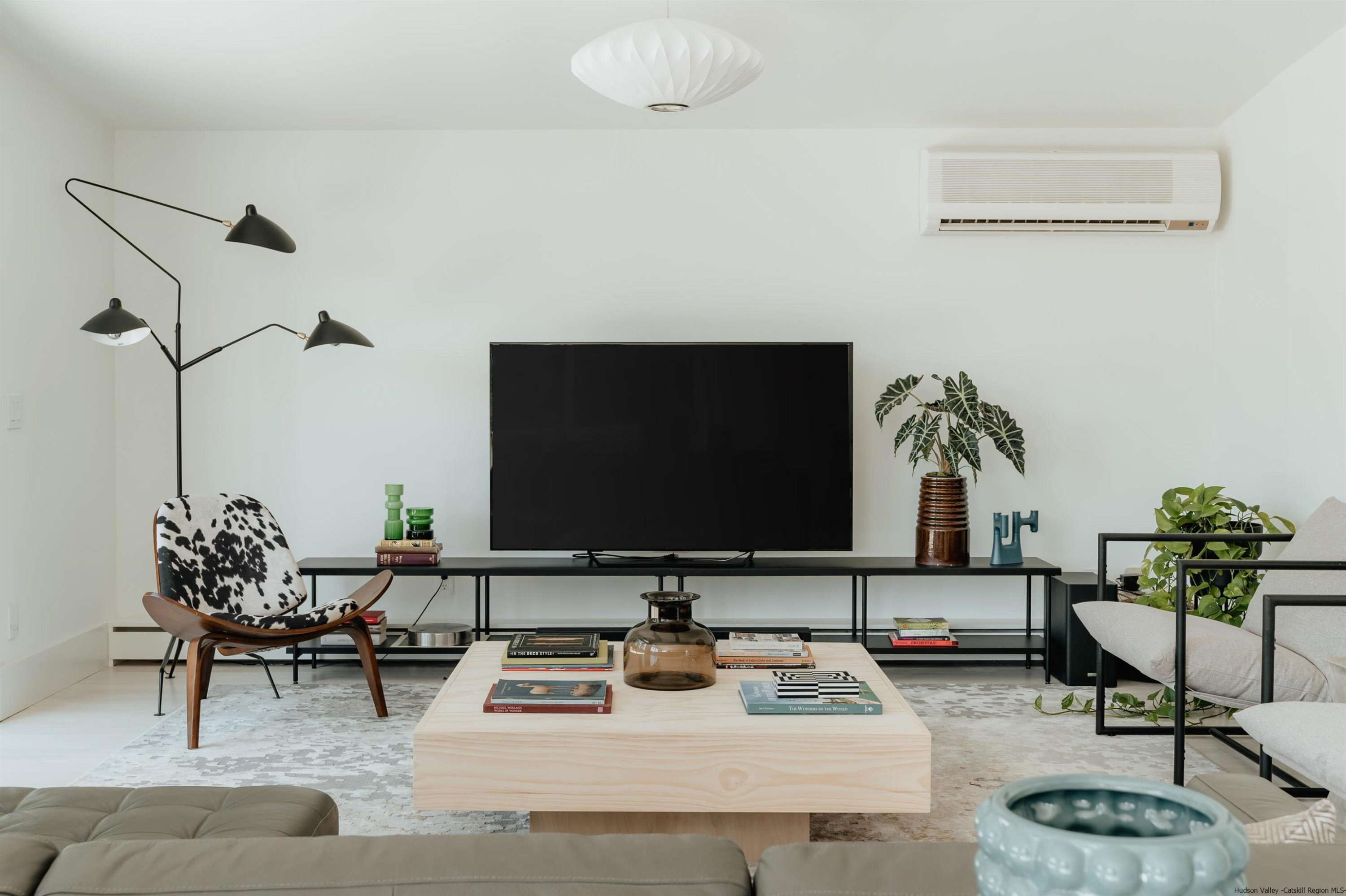 187 Bloom Road Barryville, NY 12719 - Photo 23 of 35 a living room with furniture and a flat screen tv