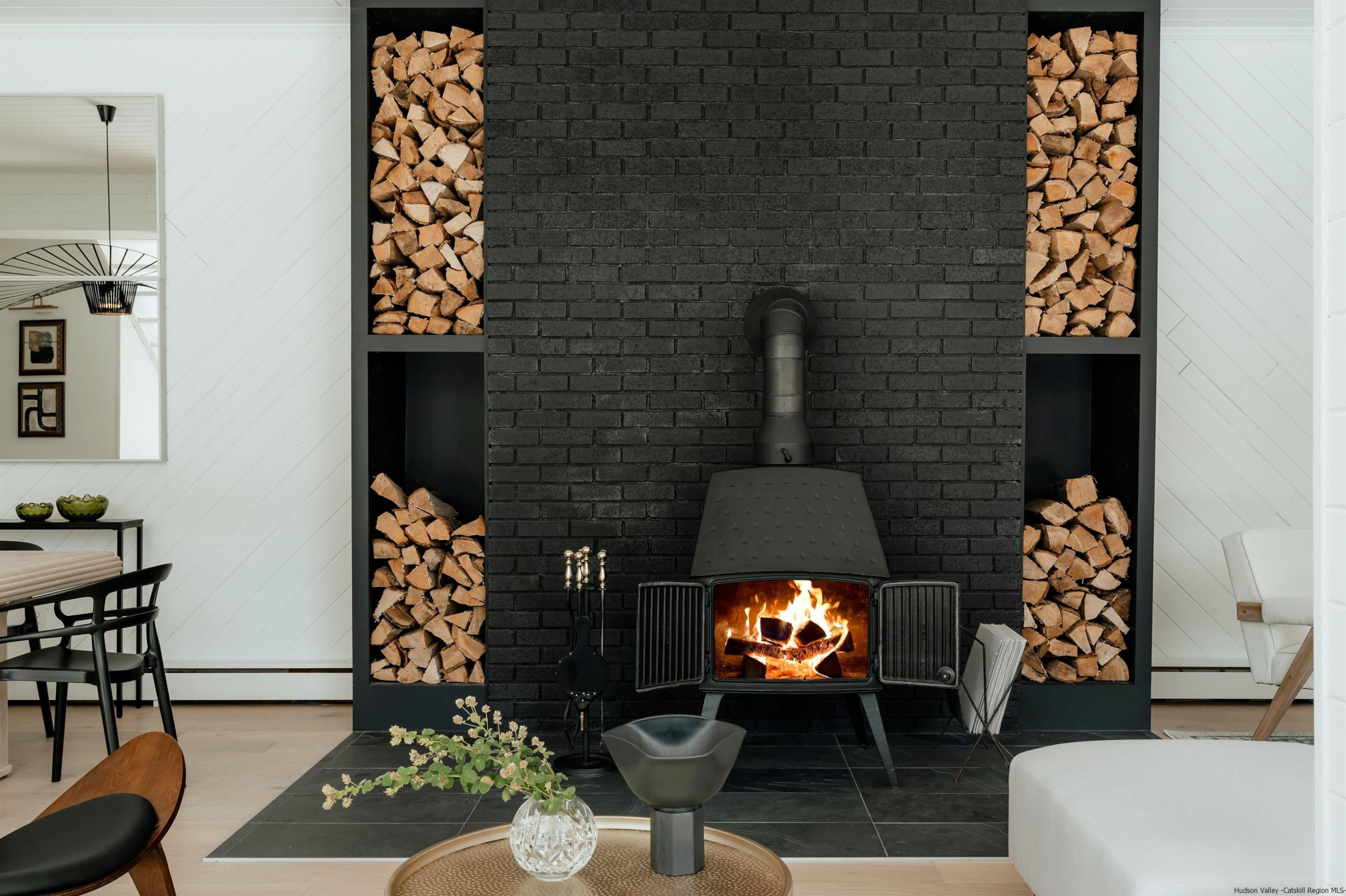 187 Bloom Road Barryville, NY 12719 - Photo 3 of 35 a living room with furniture and a fireplace