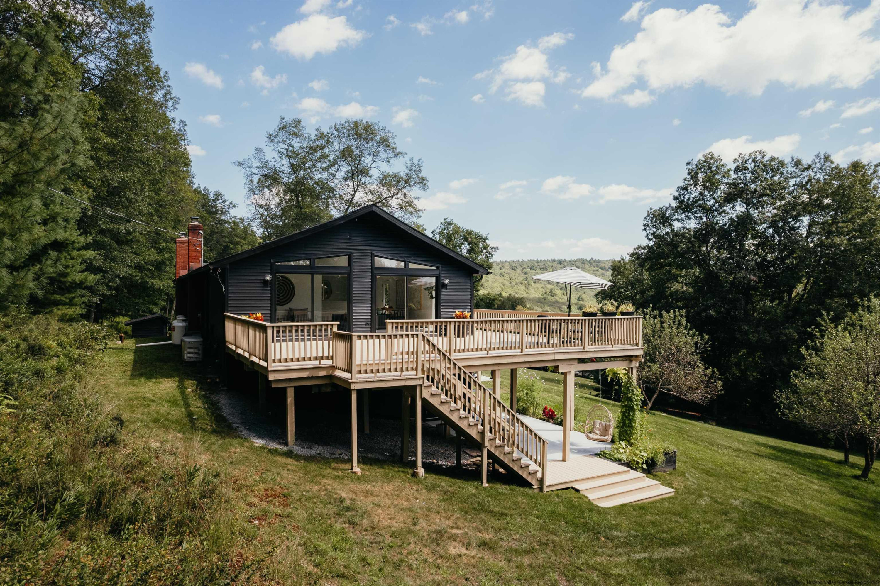 187 Bloom Road Barryville, NY 12719 - Photo 32 of 35 a house with trees in the background