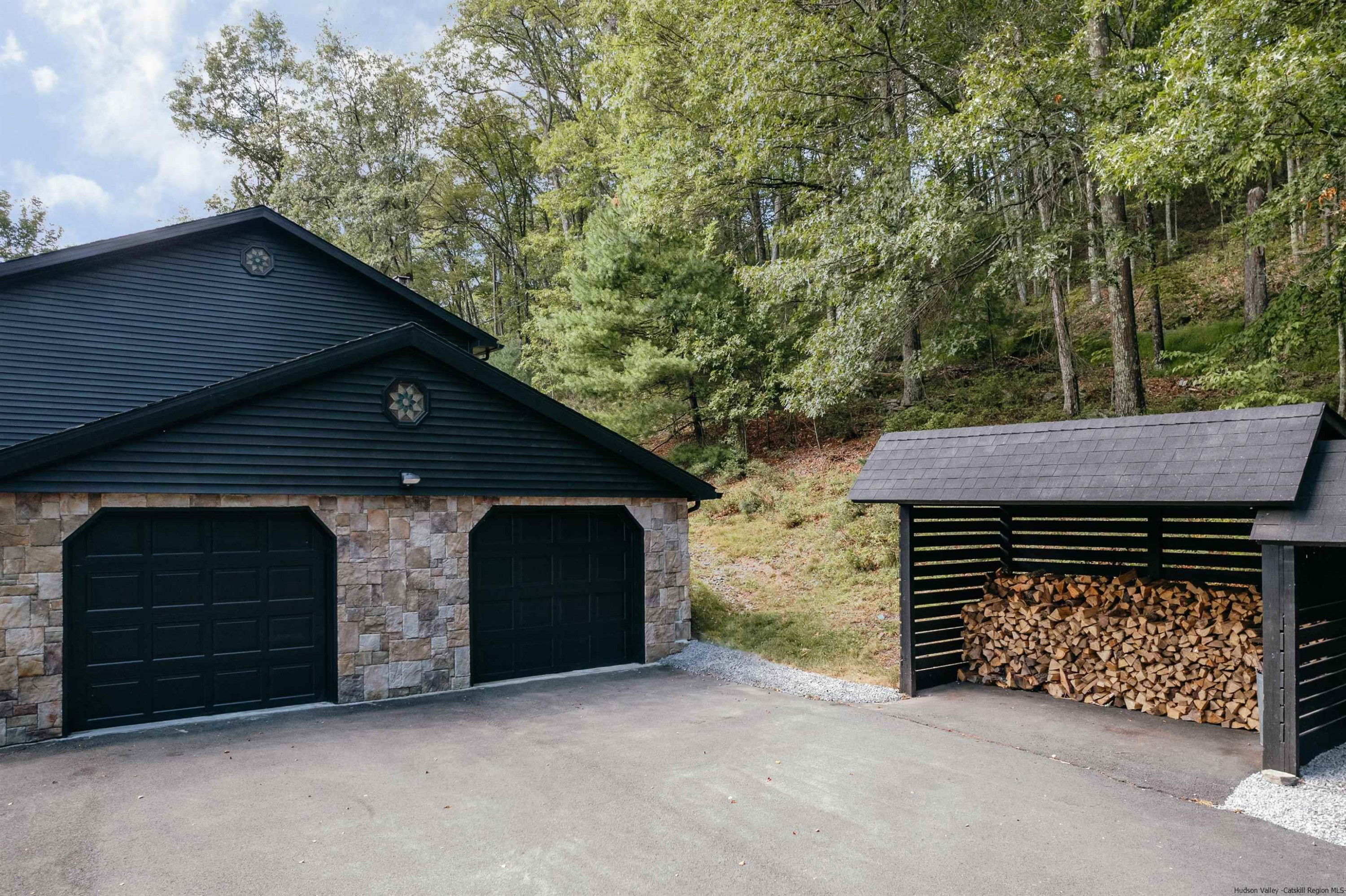 187 Bloom Road Barryville, NY 12719 - Photo 34 of 35 a front view of a house with a garage