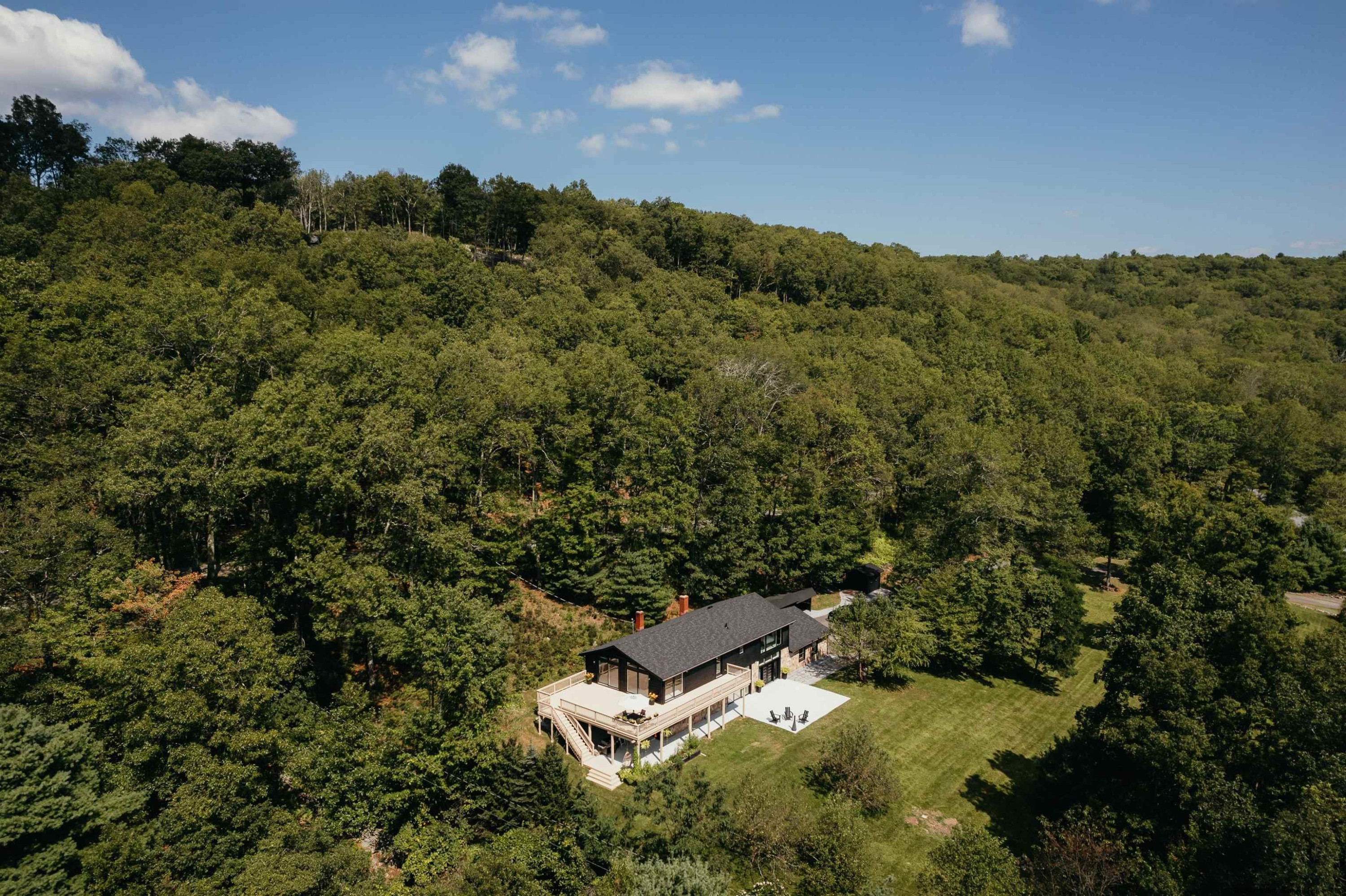 187 Bloom Road Barryville, NY 12719 - Photo 9 of 35 an aerial view of a house with mountain view