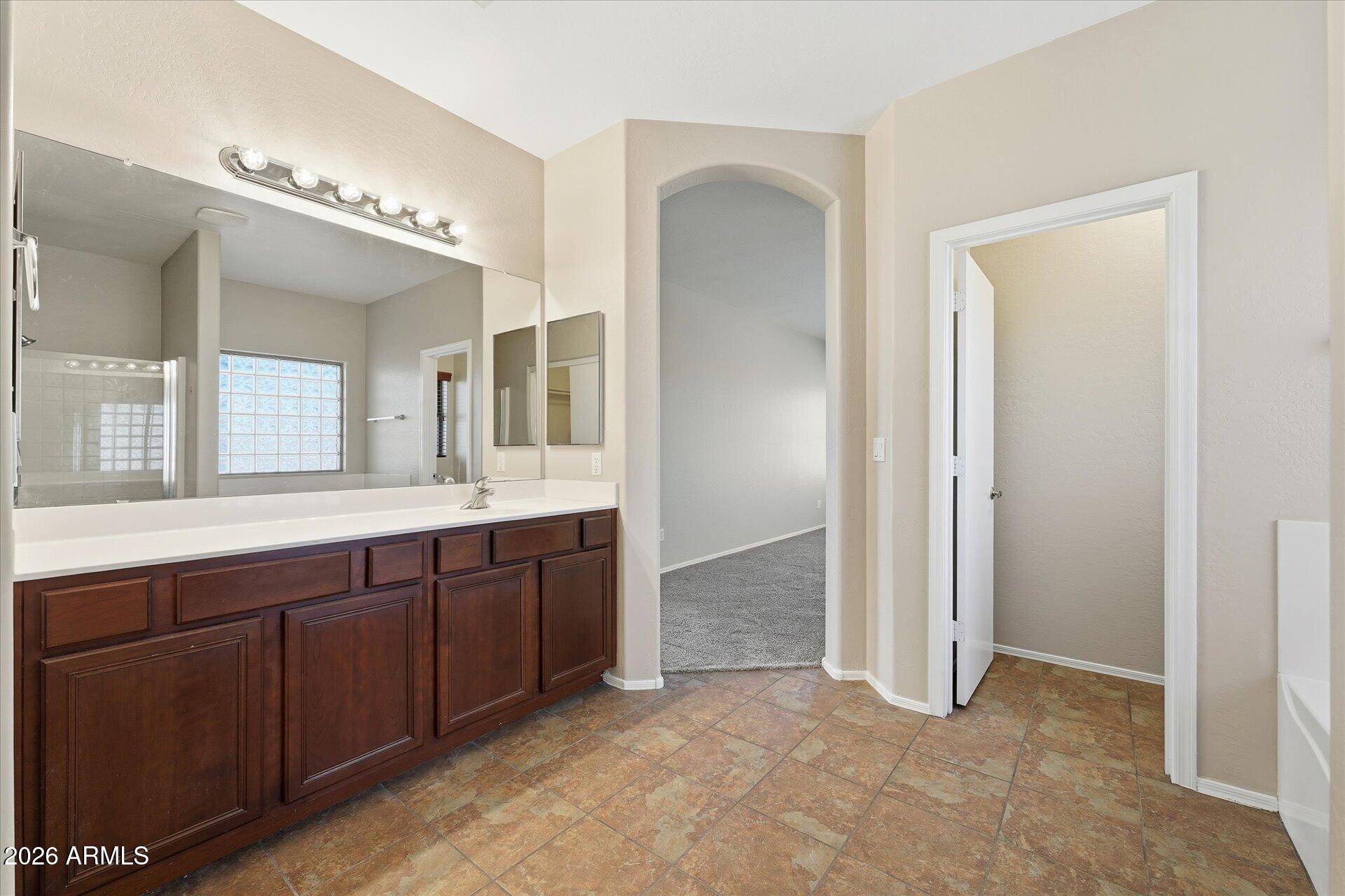 9934 East Hay Loft Road Florence, AZ 85132 - Photo 17 of 38 22-022-primary-bathroom