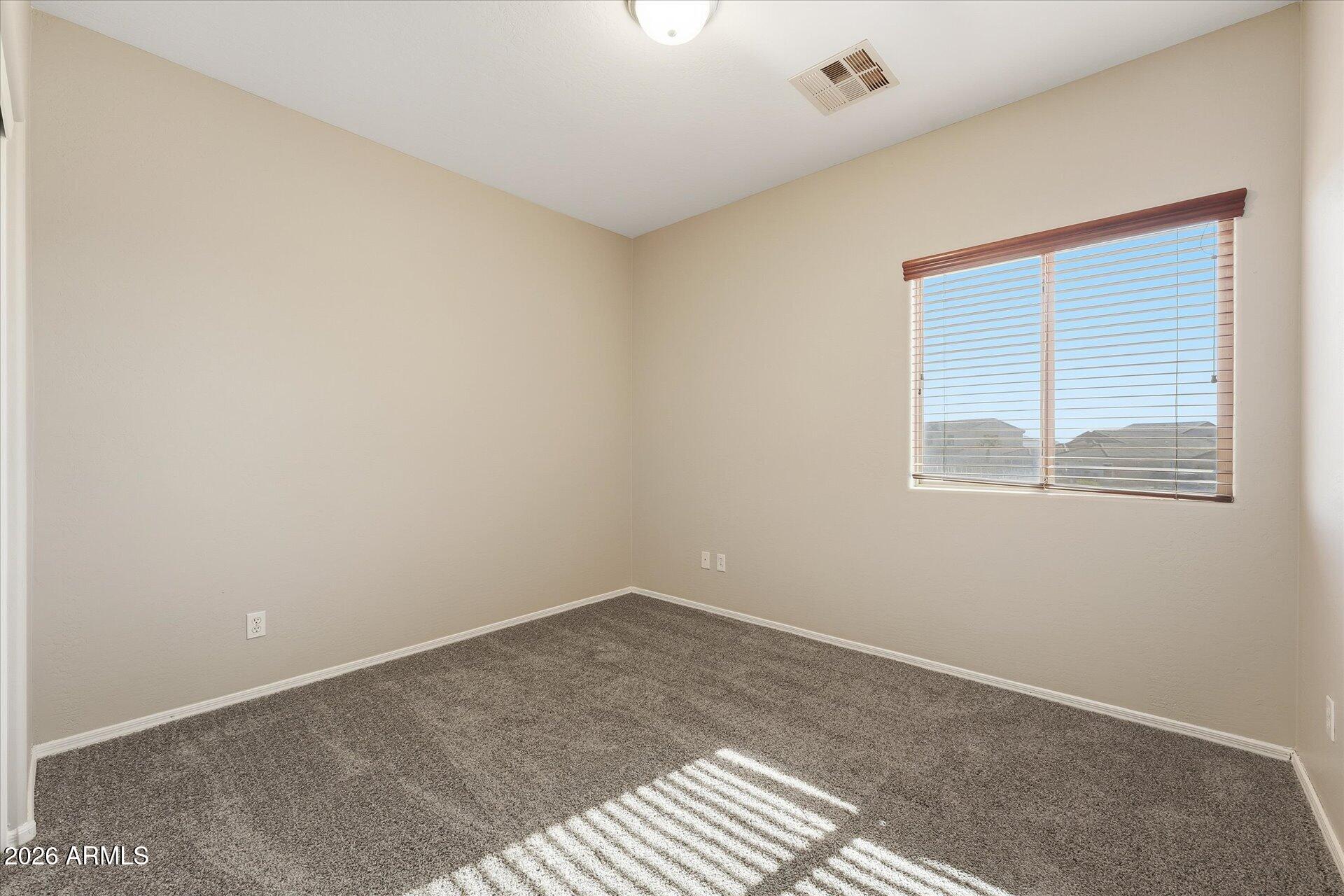 9934 East Hay Loft Road Florence, AZ 85132 - Photo 20 of 38 25-025-bedroom-2