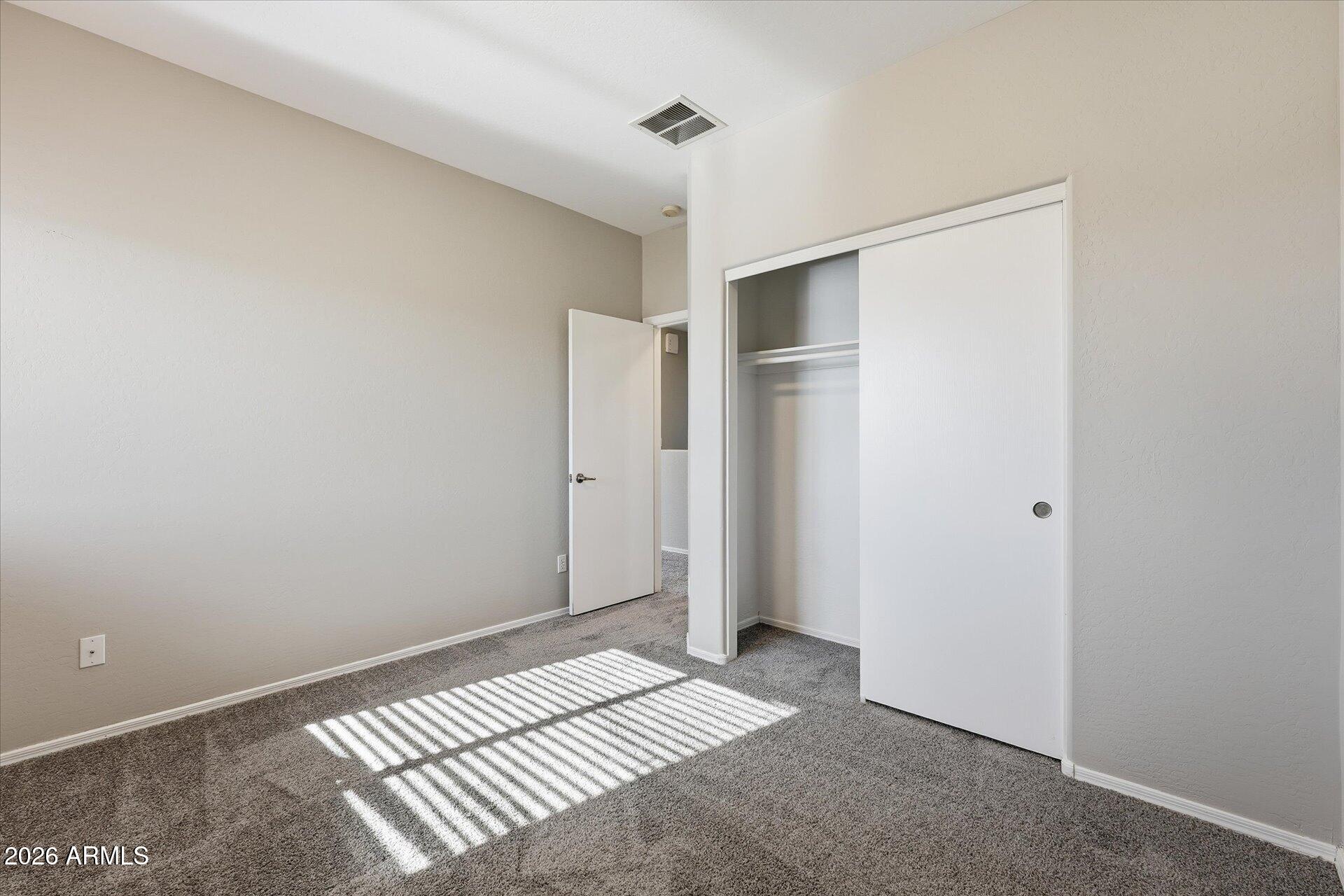 9934 East Hay Loft Road Florence, AZ 85132 - Photo 21 of 38 26-026-bedroom-2