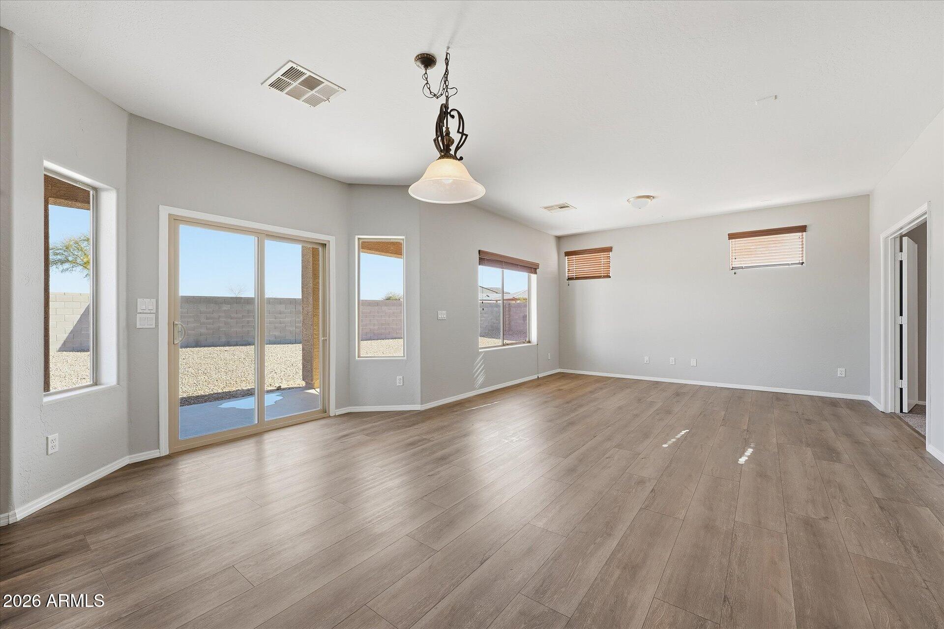 9934 East Hay Loft Road Florence, AZ 85132 - Photo 7 of 38 12-012-family-room