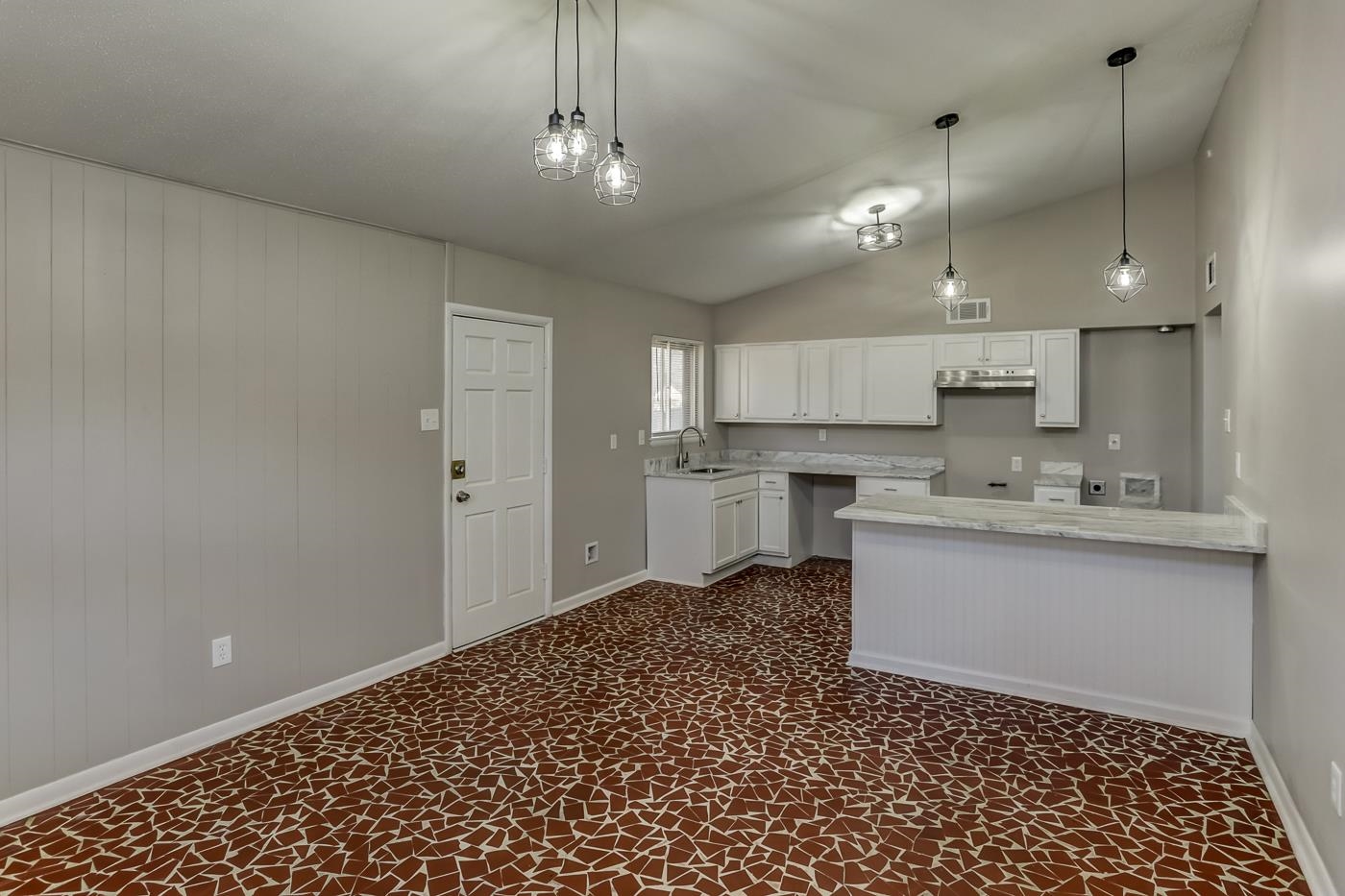 5244 Whitworth Road Memphis, TN 38116 - Photo 7 of 14 a kitchen with a sink cabinets and window