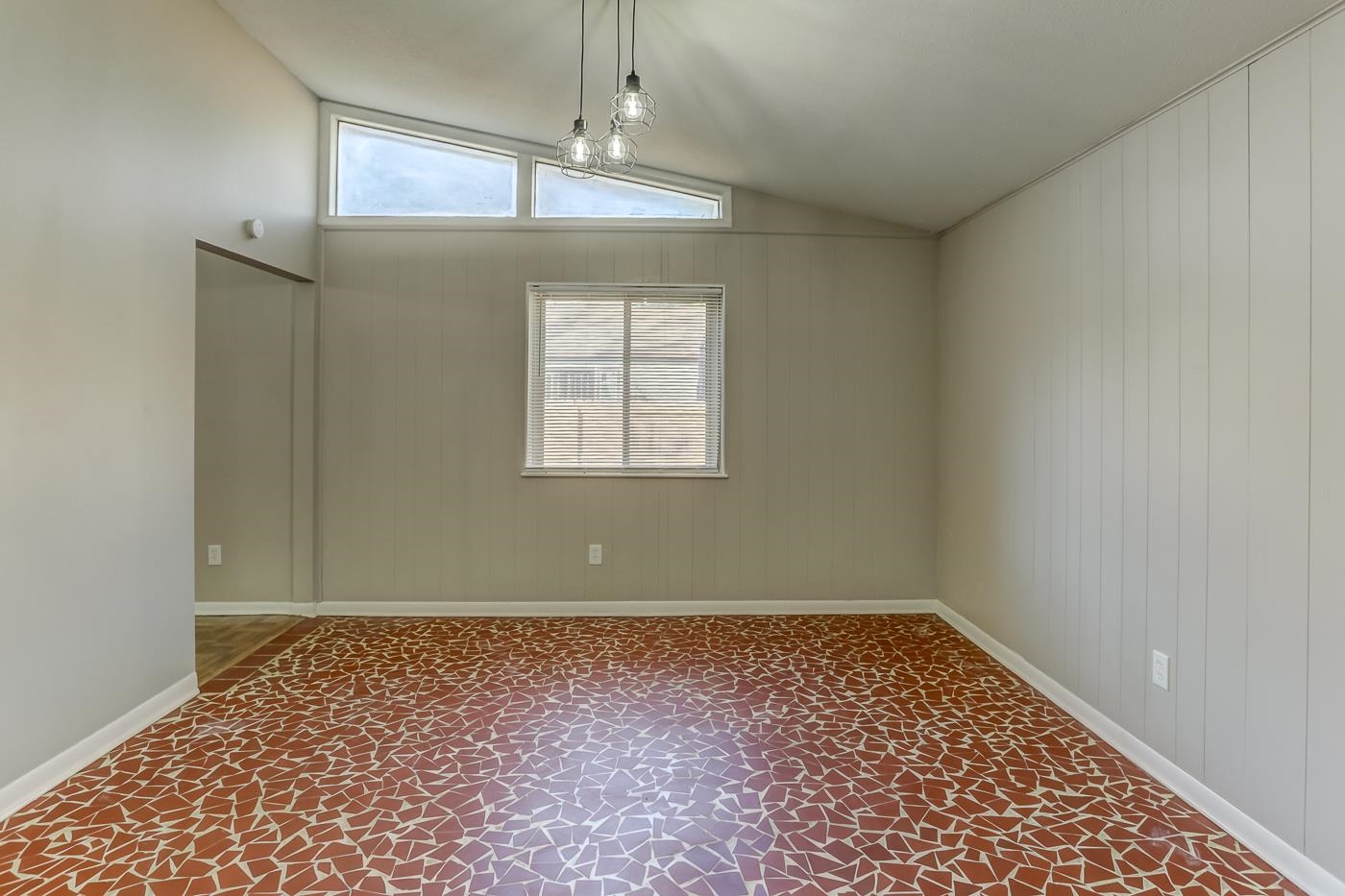 5244 Whitworth Road Memphis, TN 38116 - Photo 8 of 14 a view of an empty room with a window