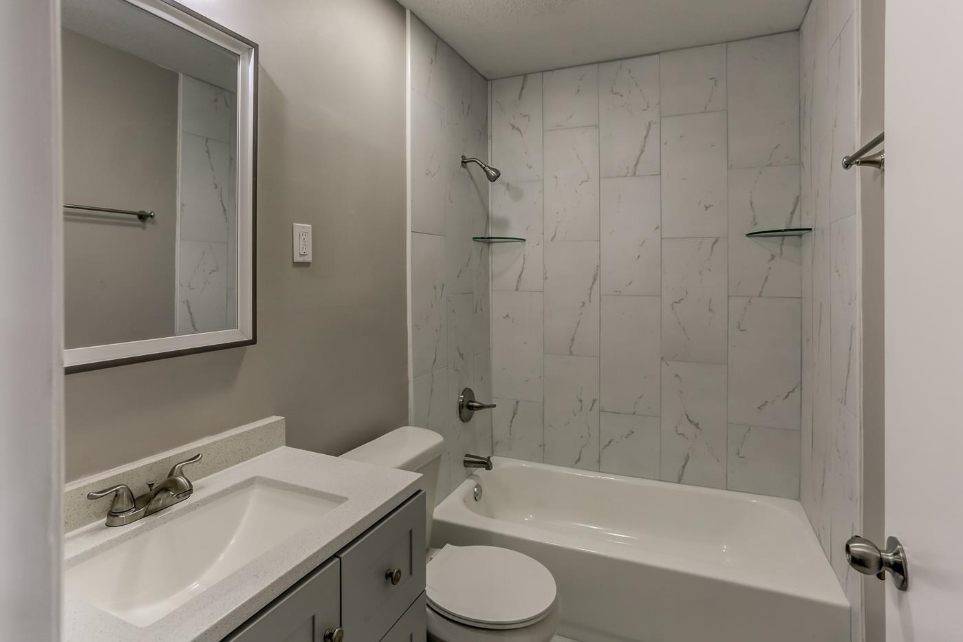 5244 Whitworth Road Memphis, TN 38116 - Photo 9 of 14 a bathroom with a sink toilet and shower