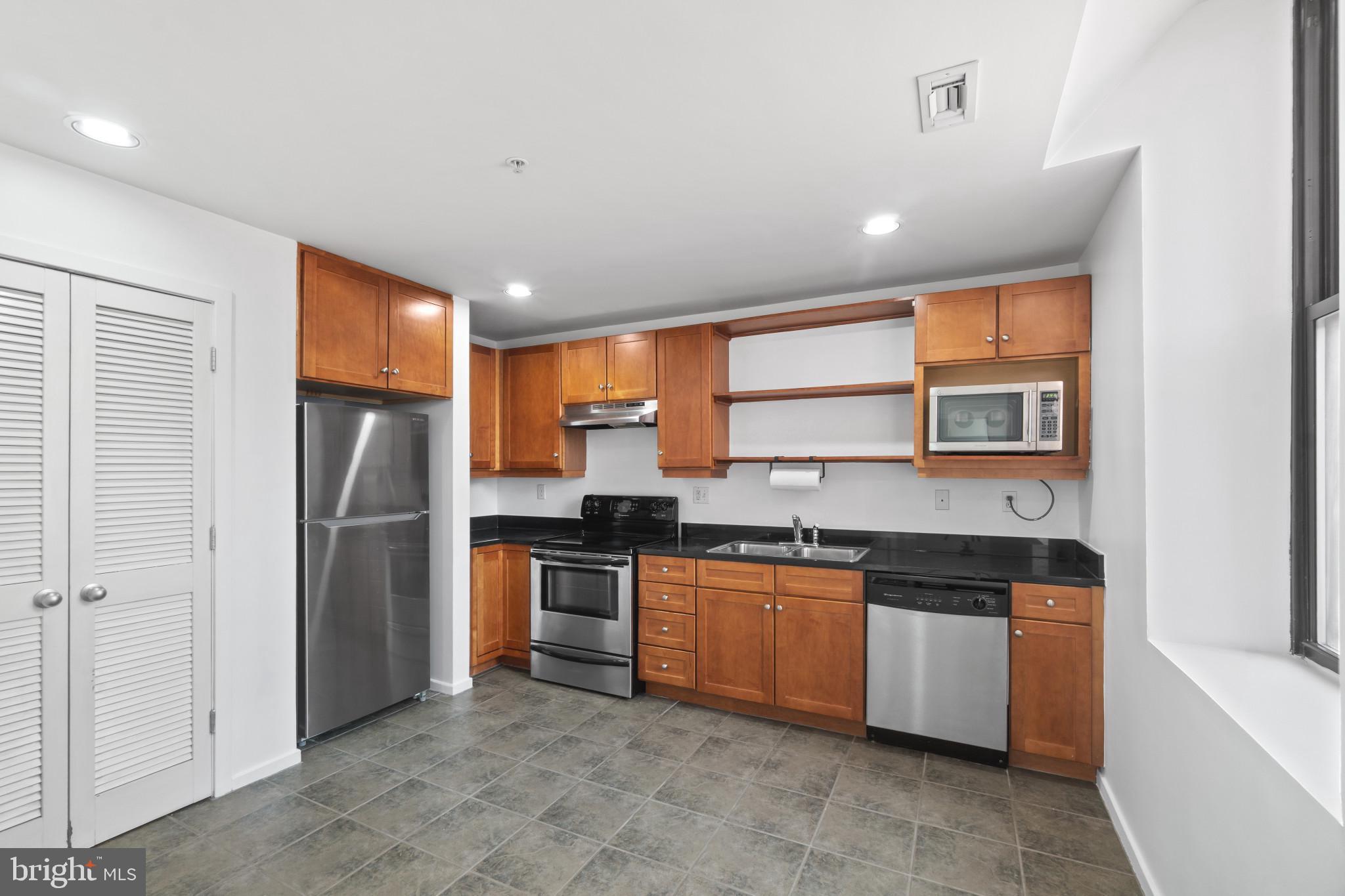 1211 Light Street, Unit 211 Baltimore, MD 21230 - Photo 14 of 34 Eat-In Kitchen With New Refrigerator