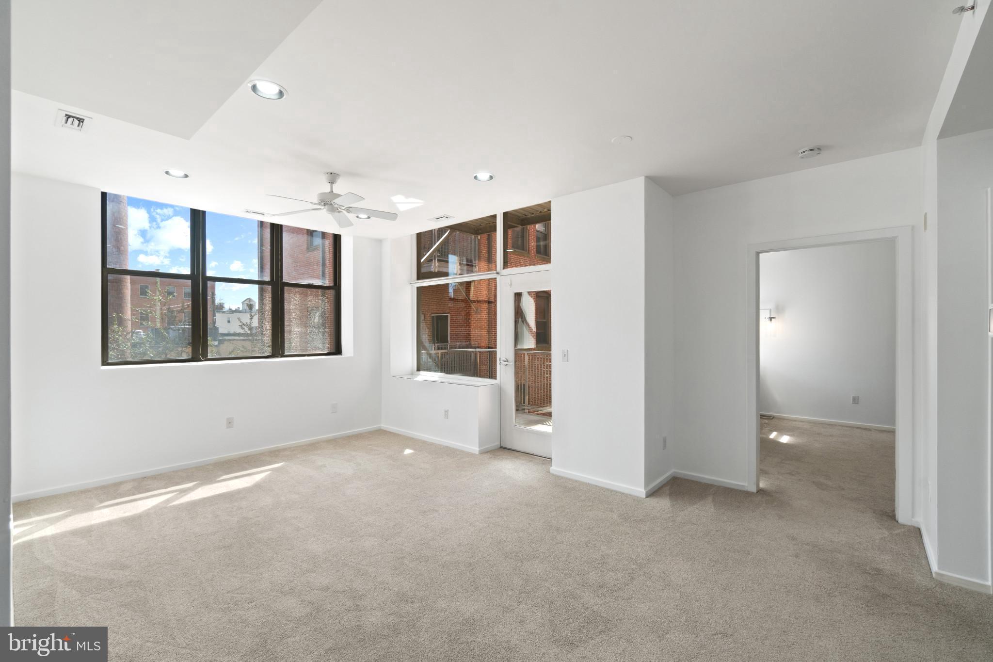 1211 Light Street, Unit 211 Baltimore, MD 21230 - Photo 6 of 34 Living Room With Lots Of Natural Light